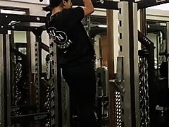 Vanessa White doing pullups at the gym.