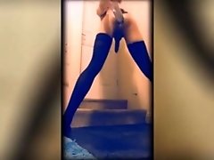 Slim crossdresser takes 13 inch long dildo wearing stockings in bathroom