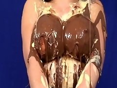 Big tits get covered in chocolate and custard