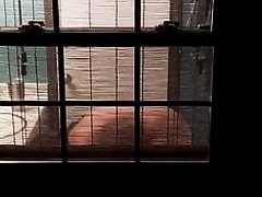 Sexy neighbor spied on through window