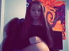 Young Pregnant Teen Shows Belly