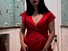 'Hot brunette in red dress masturbates in a public restaurant'