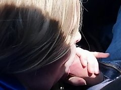 Blonde sucks cock in car