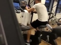 SEXY GYM TRAINER DOING CARDIO